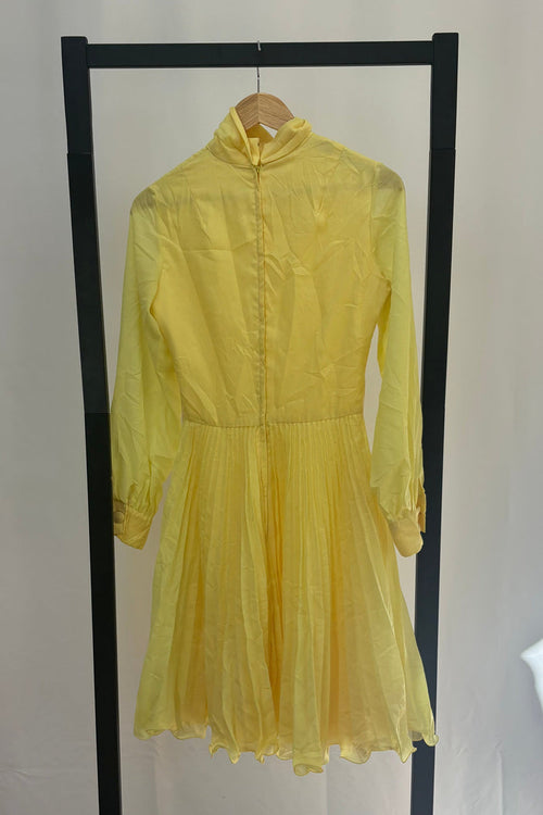 1960s Butter yellow roll neck dress with pleated skirt