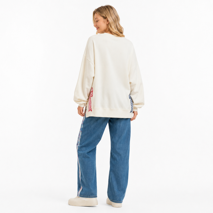 Cream patriotic sweatshirt styled for summer gatherings, travel days and everyday comfort with applique star details all day!