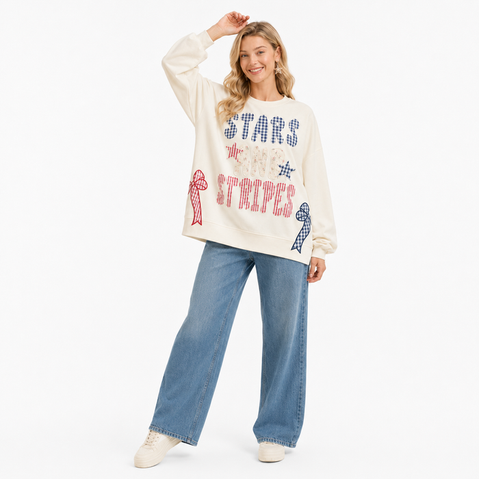 Relaxed patriotic sweatshirt with long sleeves, cotton blend comfort and detailed applique accents for seasonal outfits daily