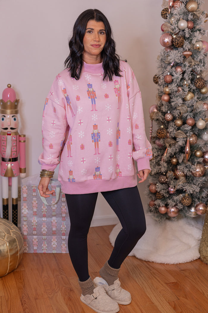 Christmas nutcrackers mock neck sweatshirt by Katydid showing angled view