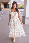 Women's cream midi dress with mustard and olive floral print sheer overlay by Blu Pepper