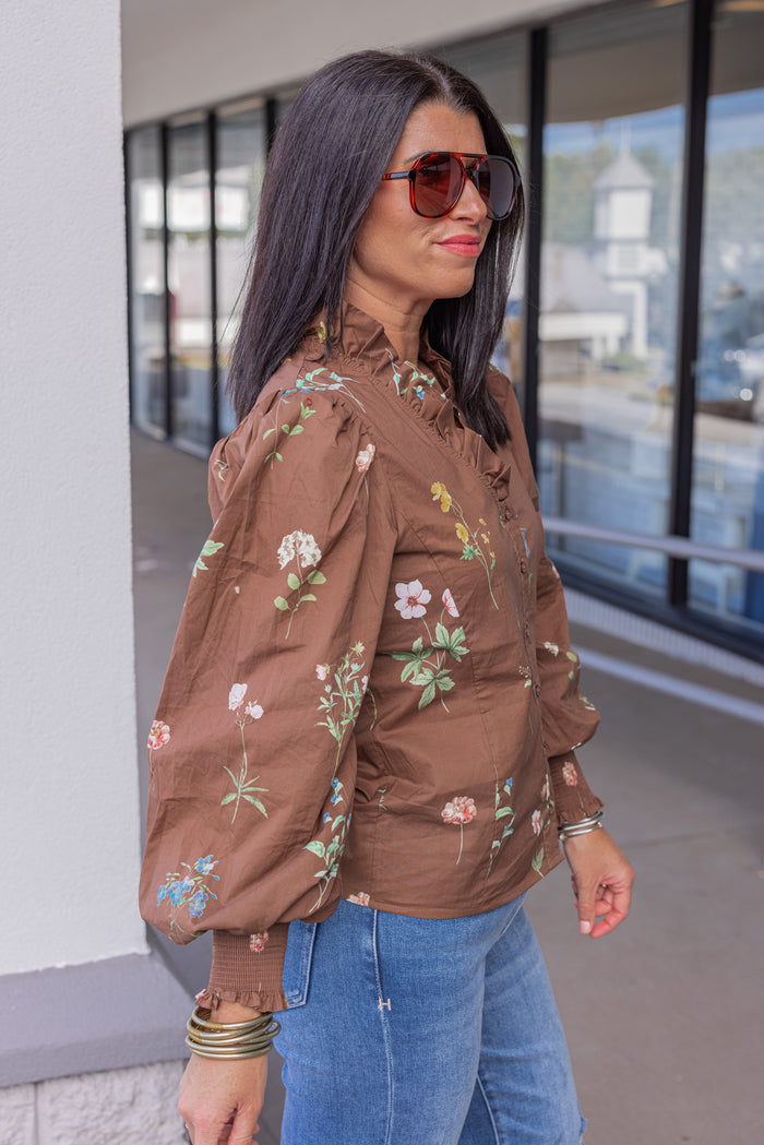 Women's brown multicolor floral print button front poplin top by Entro showing side view