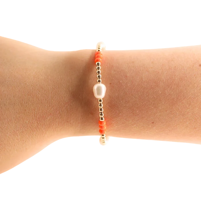 Beaded Blondes orange and Poppi pearl beaded bracelets