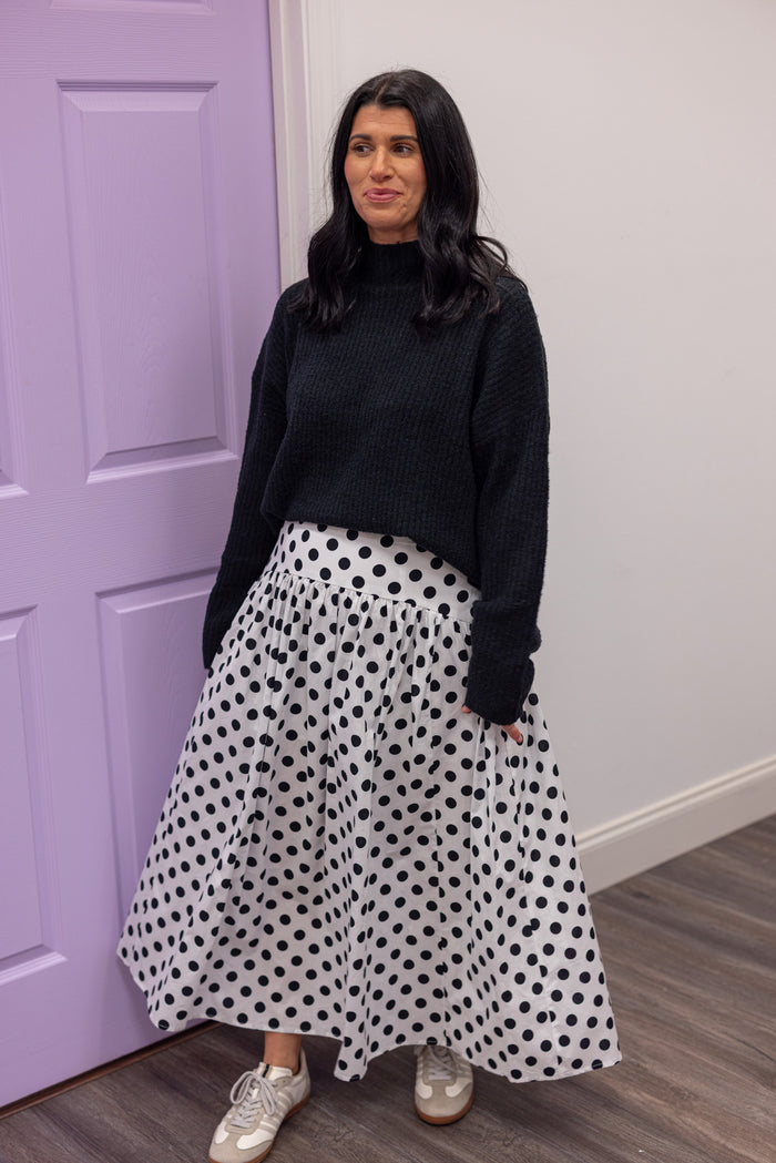 Women's black polka dot maxi skirt by Day + Moon, perfect for women of all ages