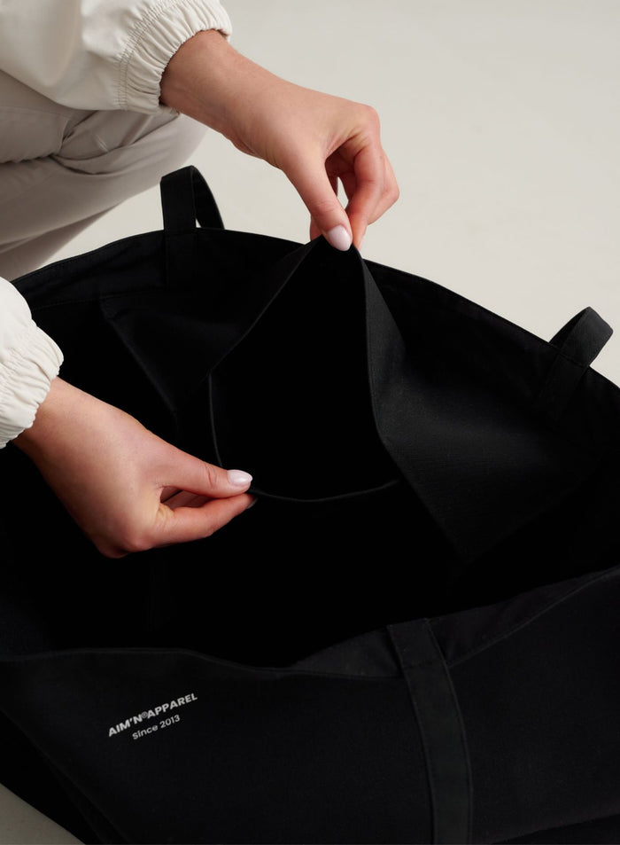Black Waterproof Apparel Tote Bag