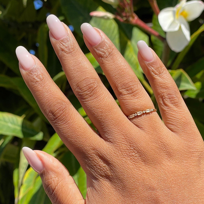 Lavender Frost - Builder Gel on natural nails featuring a sheer icy pastel lavender manicure with almond shape in sunlight