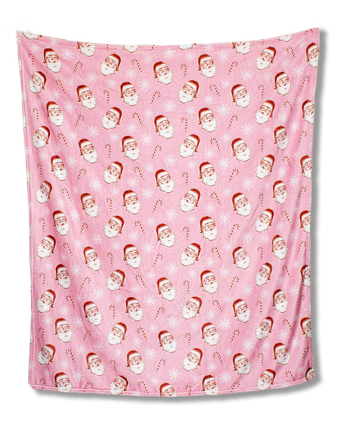 Pink Christmas throw with Santa Claus and candy canes