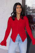 Women's red ribbed sweater knit top with a twisted front and peekaboo shoulders by So Me