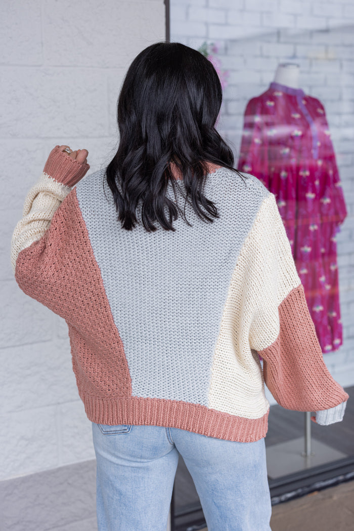 Women's dusty rose and light blue knit colorblock sweater by Wishlist showing up close back view