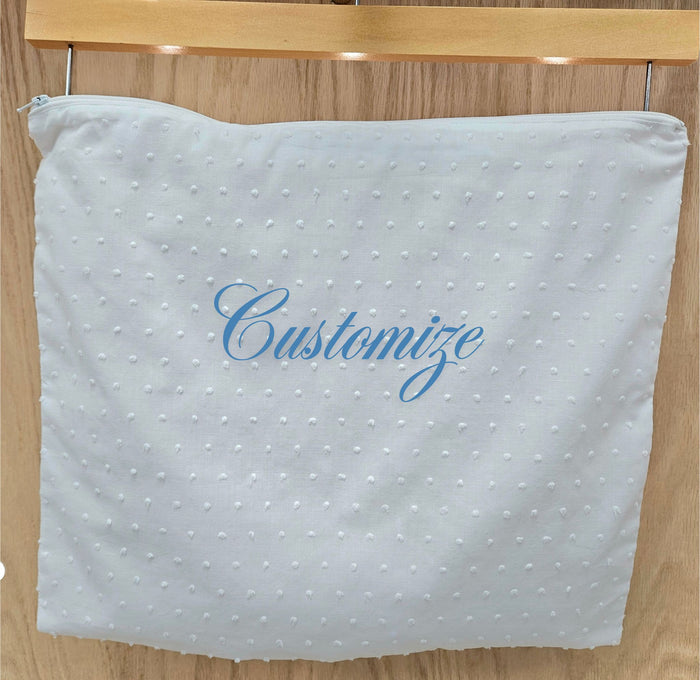 White cotton dot zipper top envelope with custom embroidery.