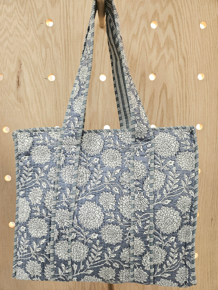 denim quilted tote bag hanging