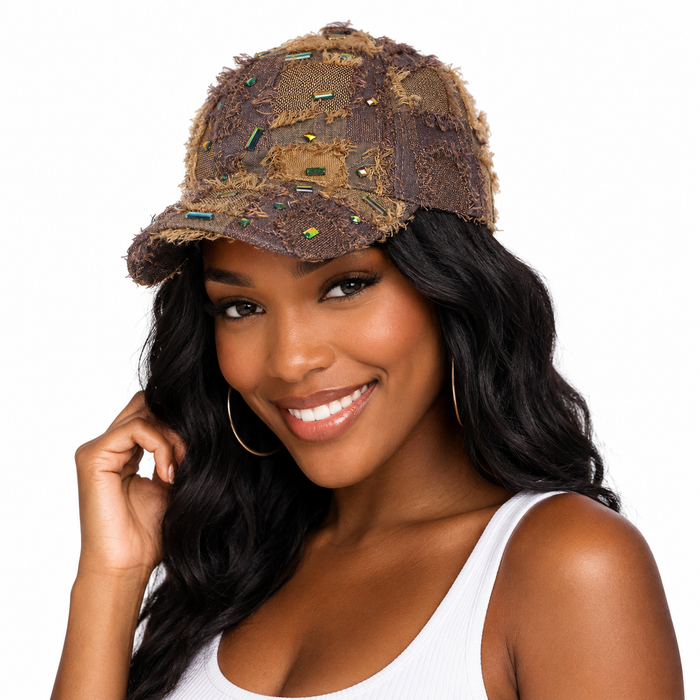 Distressed baseball cap with fringed detail, shiny diamond accents, retro woven finish and casual hip-hop streetwear styling.