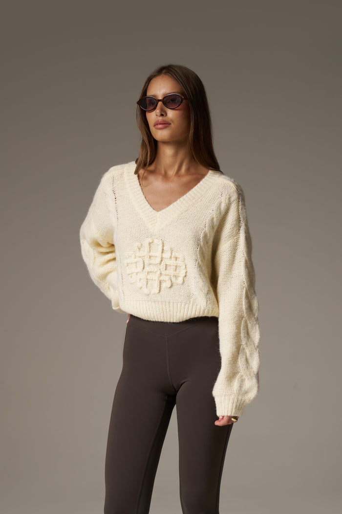 EMBLEM KNITTED V NECK JUMPER - BUTTERMILK