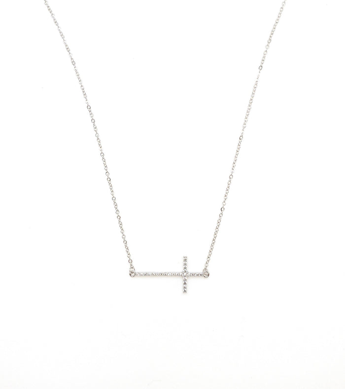Silver sideways cross necklace.