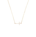 Gold sideways cross necklace.
