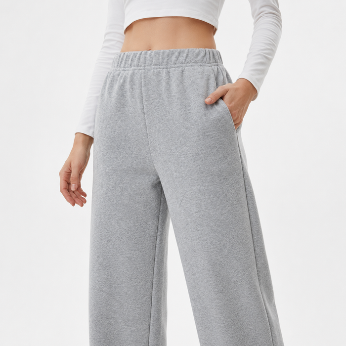 Warm lined pants for women with plush fleece inside, smooth polyester outside and a flattering high waist straight cut style.