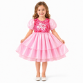 Girls' pink sequin dress on a child model with the tiered satin skirt held open for detail.