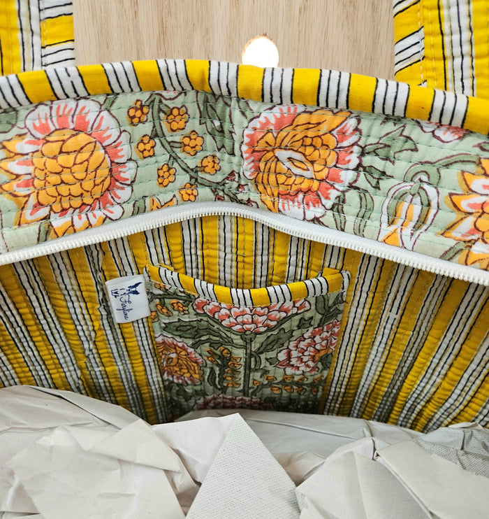 Open tote bag with inside pocket.