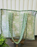 green floral quilted bag