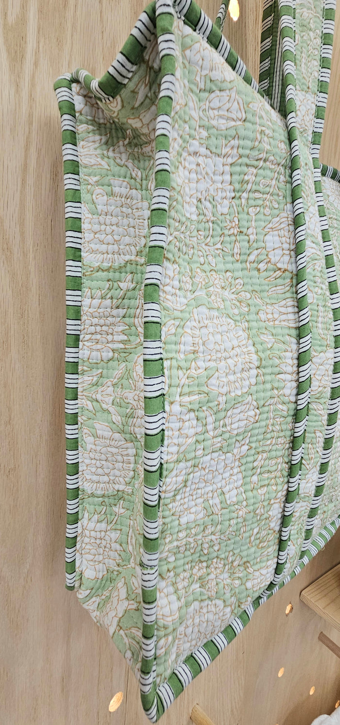 green floral quilted bag