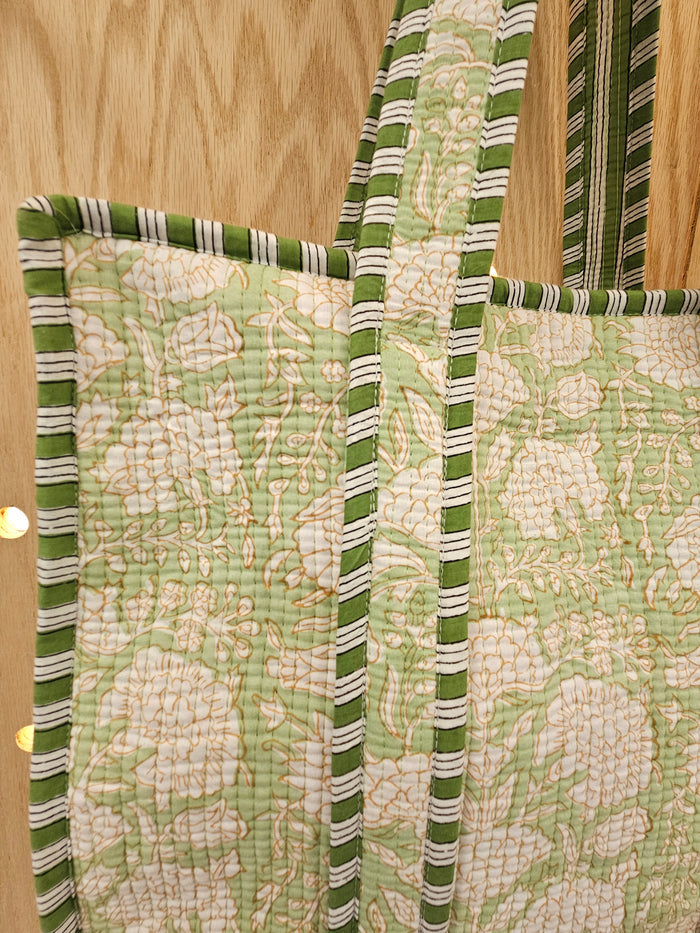 green floral quilted bag