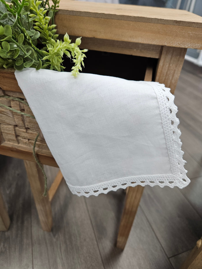 White cotton handkerchief with picot edges.