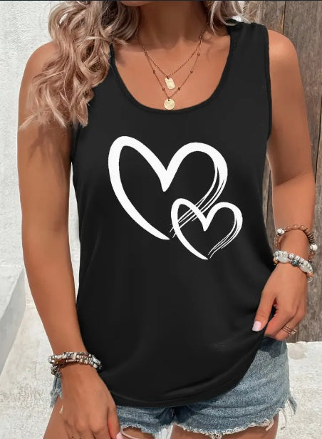 Model wearing a fitted sleeveless top with heart print for an easy everyday outfit