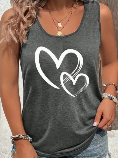 Flat lay of a casual sleeveless top with all-over heart design and classic crew neck cut