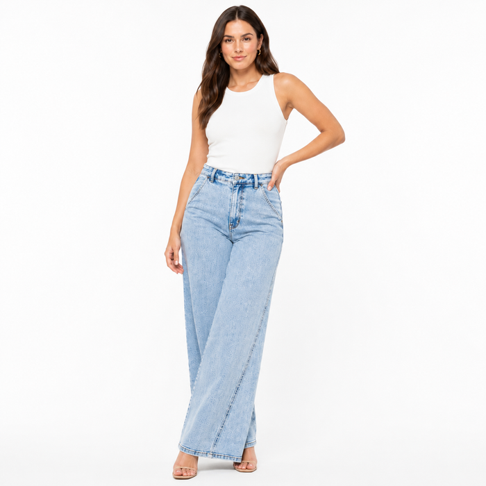 Light wash wide leg jeans styled with heels, high waist fit and soft stretch denim blend for polished casual outfits look now