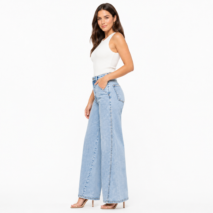 Judy Blue high waist jeans with wide leg silhouette, light wash texture, back pockets and clean polished denim finish fit now