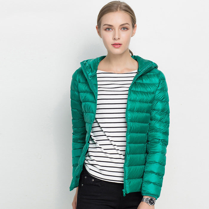 women lightweight down jacket black minimalist cold weather look