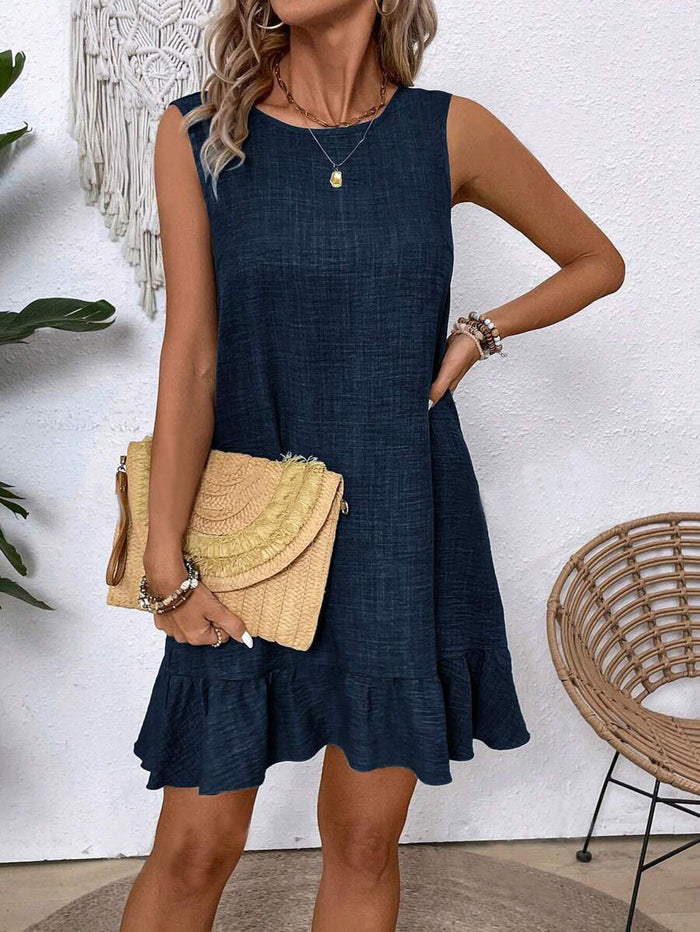 Women's casual summer ruffle beach dress outdoor vacation setting loose straight silhouette effortless warm style