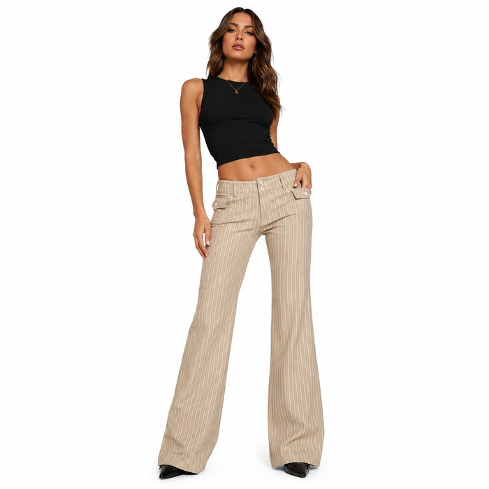 Office siren pinstripe trousers paired with fitted blazer and ankle boots