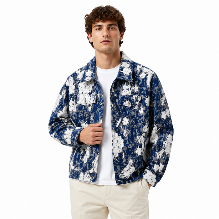 Man wearing a blue and white floral patterned jacket on a white background