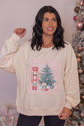 Women's cream corduroy patch sweatshirt with a nutcracker and Christmas tree by Peach Love California