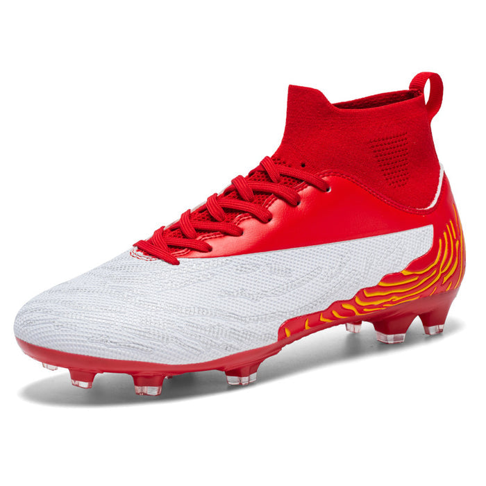 White and red outdoor soccer shoes laid out flat, colorway detail shot on dark background