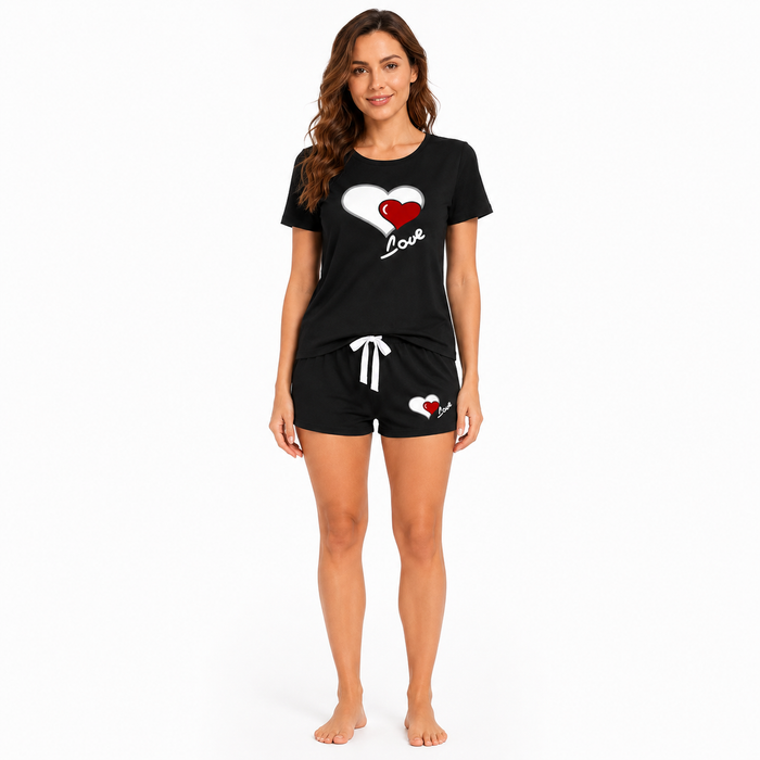Black short sleeve pajama set with heart print top and matching shorts for cute home wear and relaxed evening lounging style.