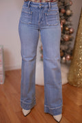 Risen Jeans medium washed denim flare jeans with patch pockets