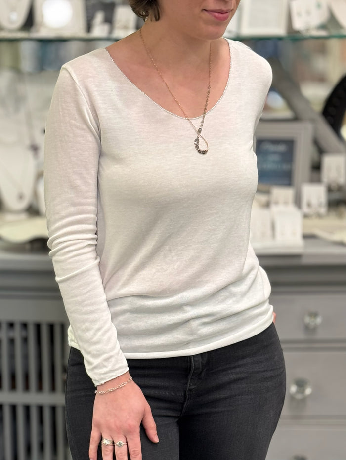 Person wearing petals in the mist nh necklace