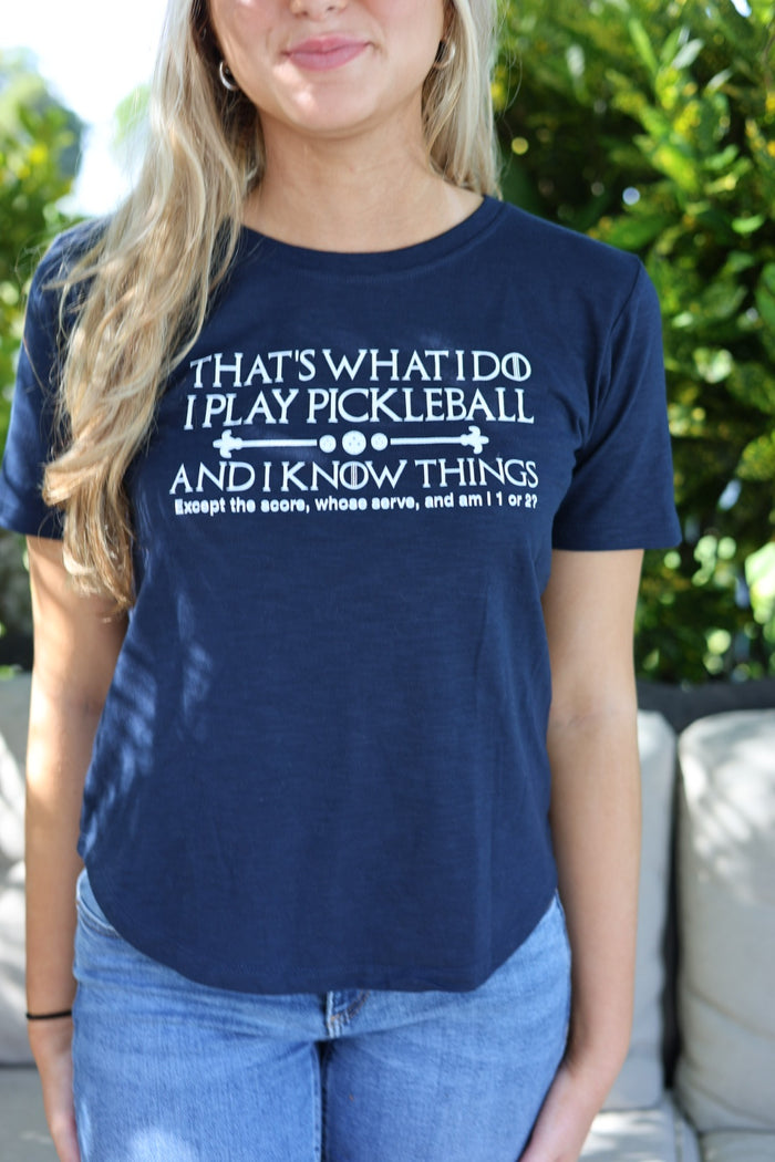 women wearing pickle ball shirt in navy