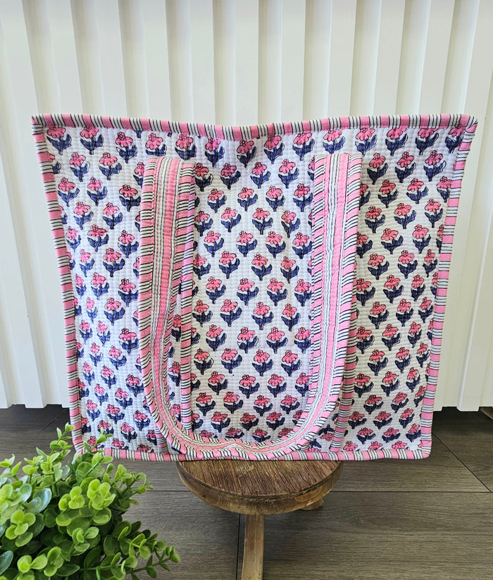 pink and blue quilted bag