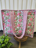 pink floral quilted bag