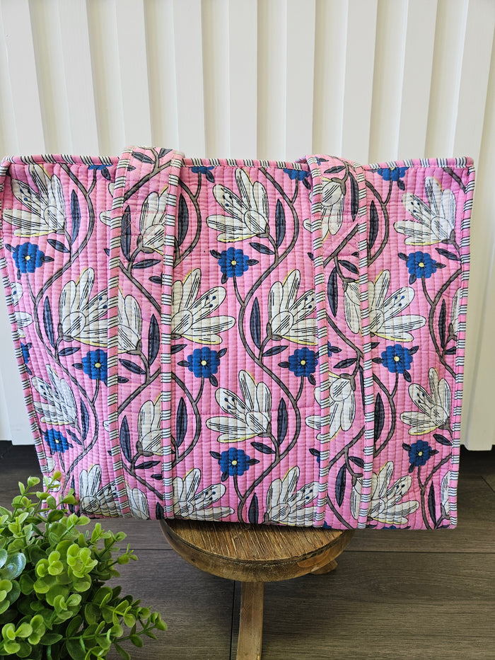 pink quilted bag with flowers