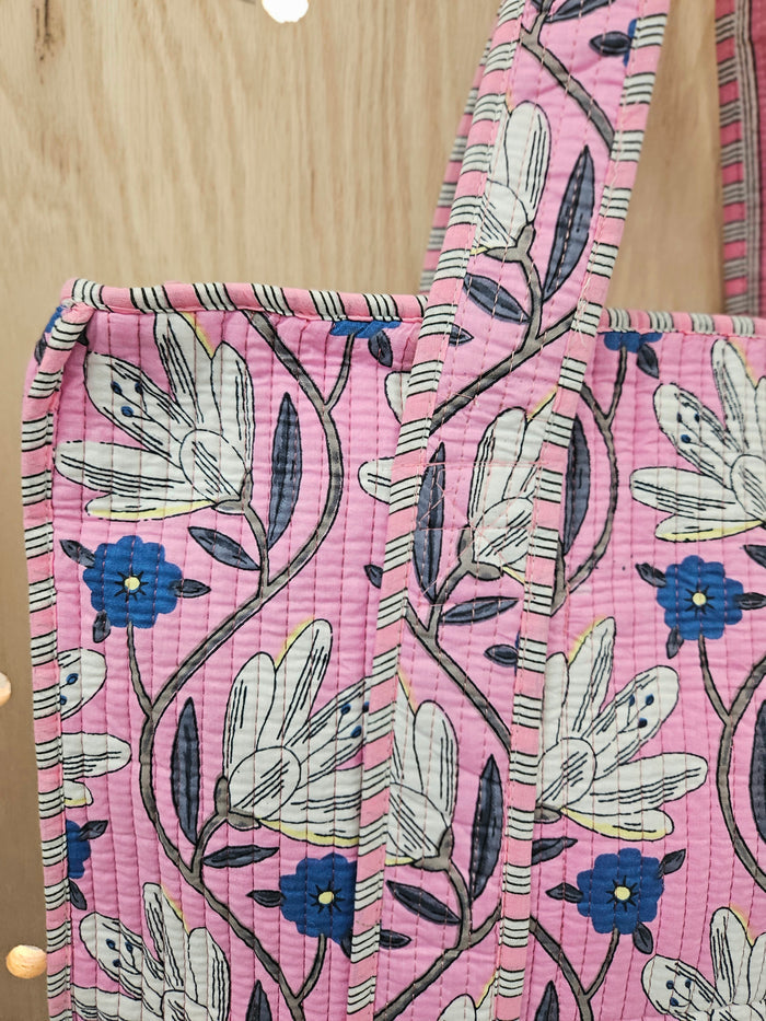 pink quilted bag with flowers