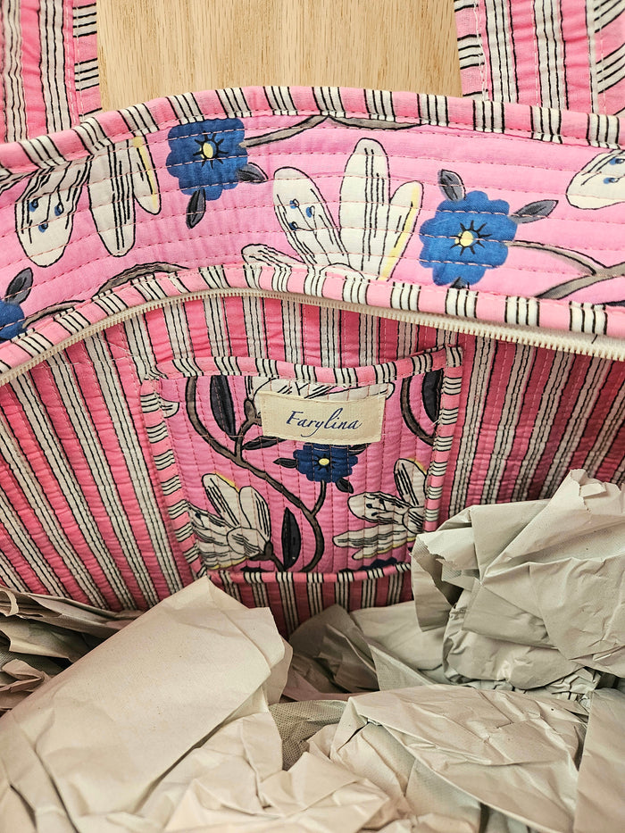 pink quilted bag with flowers