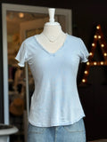 Reece Raw Edge Tee in sky blue on mannequin paired with denim