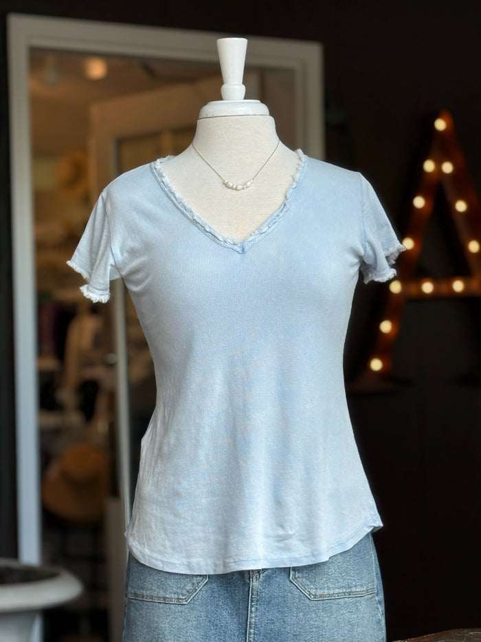 Reece Raw Edge Tee in sky blue on mannequin paired with denim