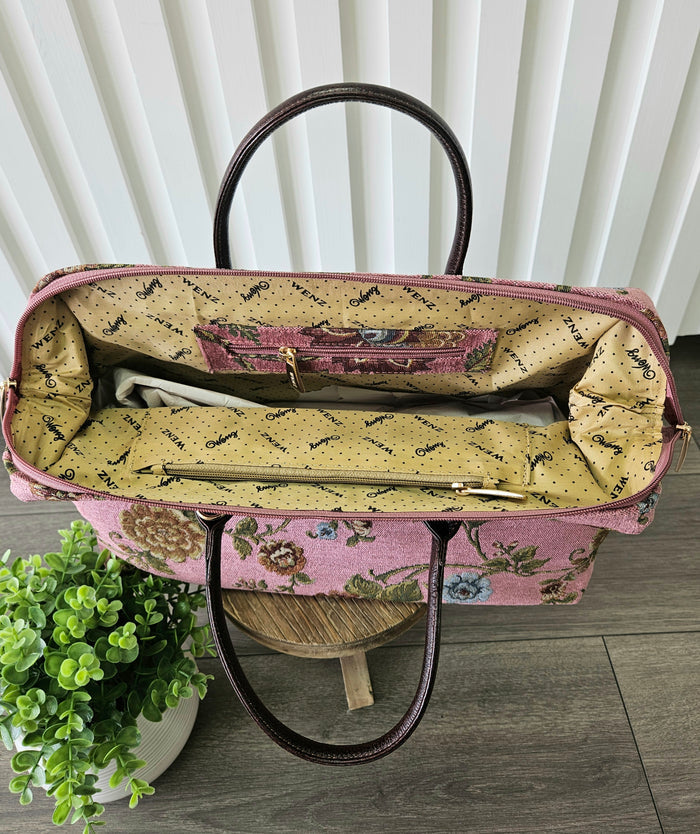Open carpet bag.