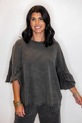 Women's mineral washed black slub top with ruffle trimmed sleeves by Easel