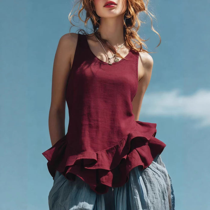 Ruffle hem women’s top shown with soft movement and relaxed drape